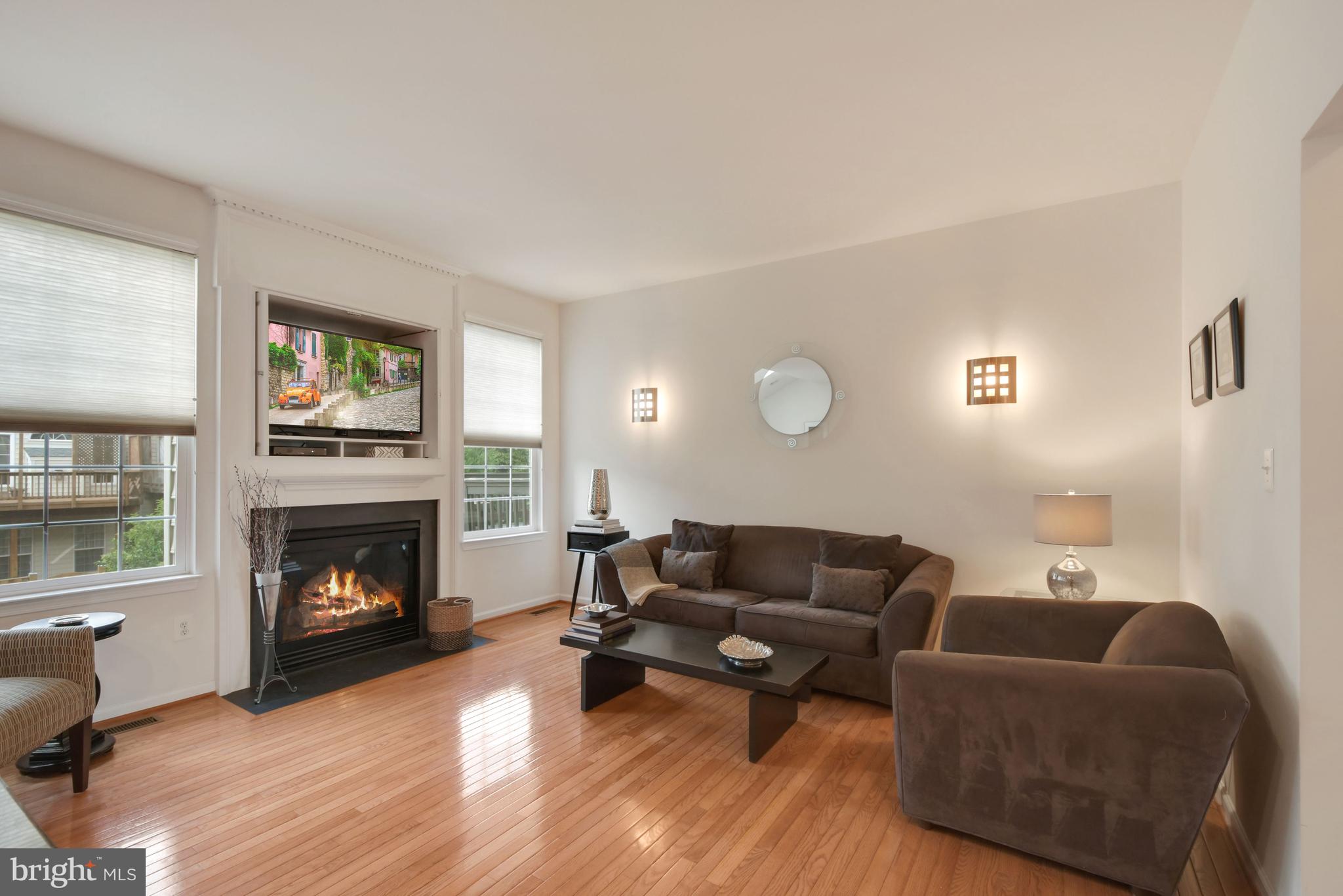 25523 Beresford Drive Chantilly, VA 20152 - Photo 9 of 48 Family Room with Gas Fireplace off the Kitchen