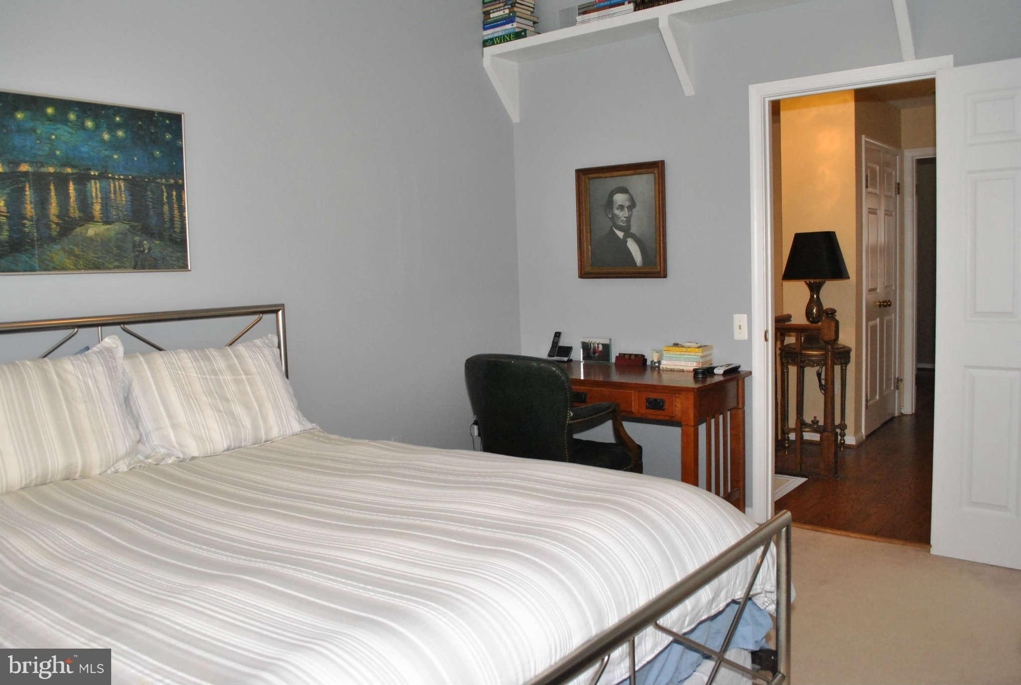 1219 Portner Road Alexandria, VA 22314 - Photo 16 of 27 Main Bedroom has Vaulted Ceiling and Ceiling Fan