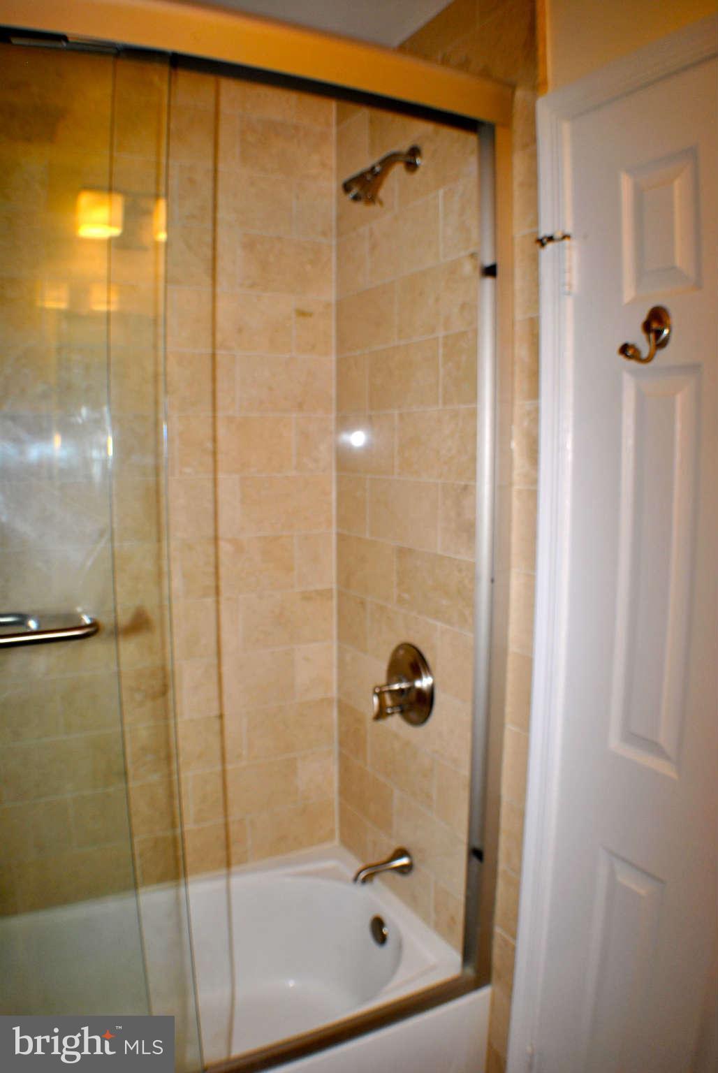 1219 Portner Road Alexandria, VA 22314 - Photo 19 of 27 Brand New Marble Surrounds Bath/Shower