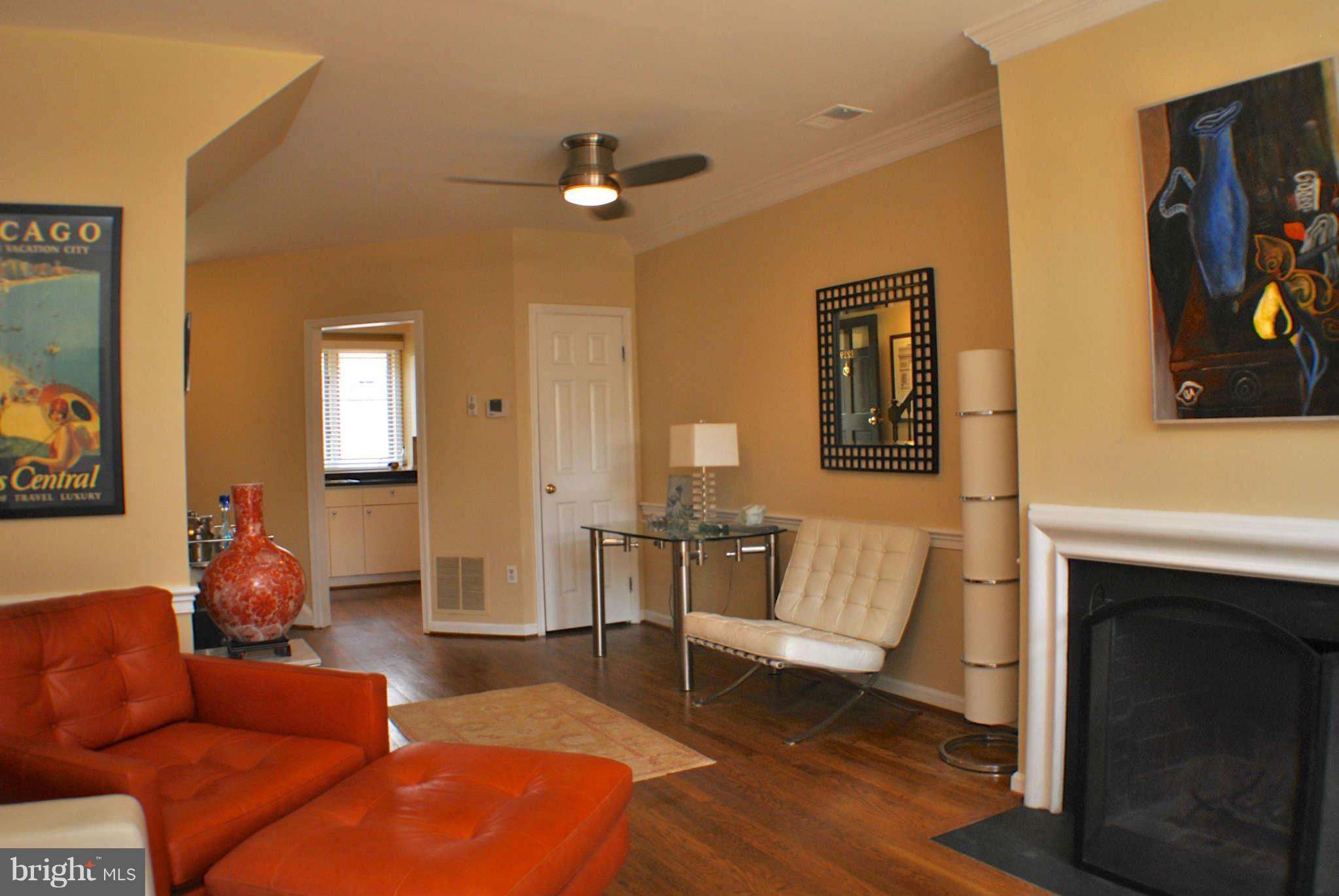 1219 Portner Road Alexandria, VA 22314 - Photo 9 of 27 Dining Area with Crown Molding and Chair Rail