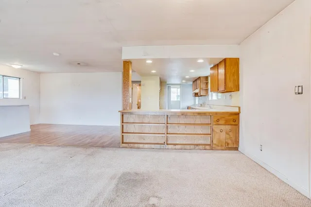 a view of a room with cabinets and couch