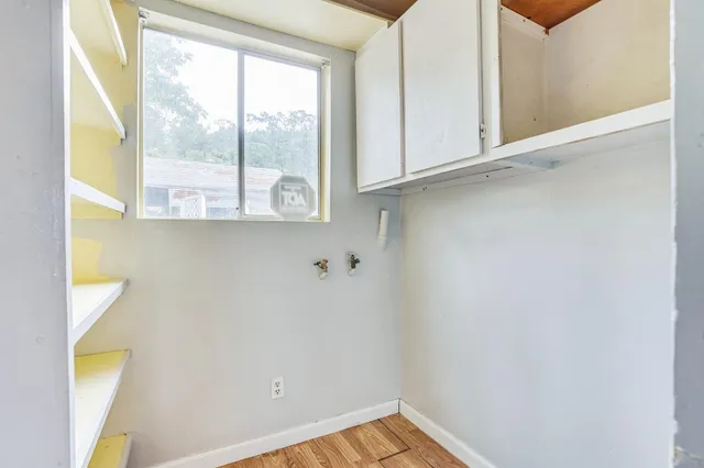 a view of a room that has a window