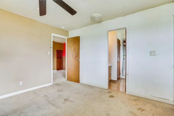 a view of an empty room and window