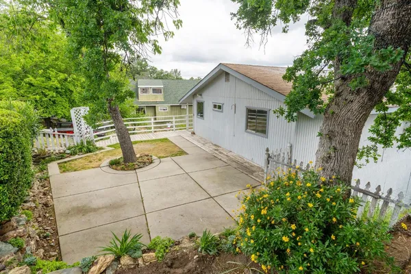 a house view with a outdoor space
