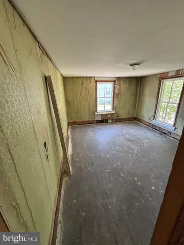 a view of a room with windows