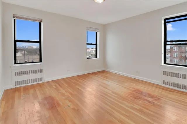 a view of a city with tall buildings