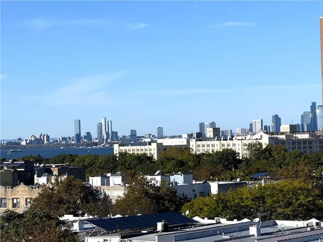 a view of a city with tall buildings