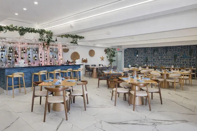 a view of a livingroom with furniture and window