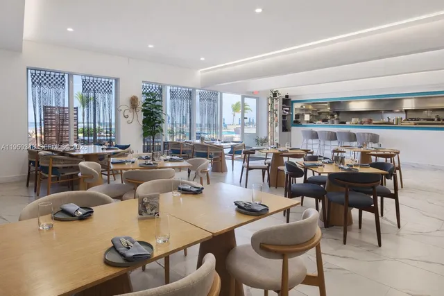 a view of a chair and table in the balcony