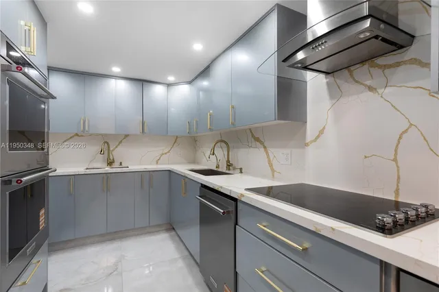 a kitchen with a sink and cabinets