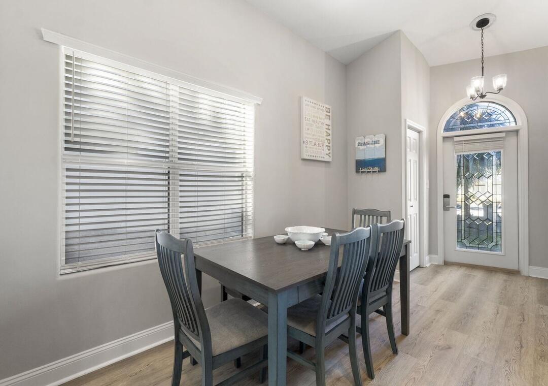 108 Terra Cotta Way Destin, FL 32541 - Photo 13 of 42 a dining room with furniture and window