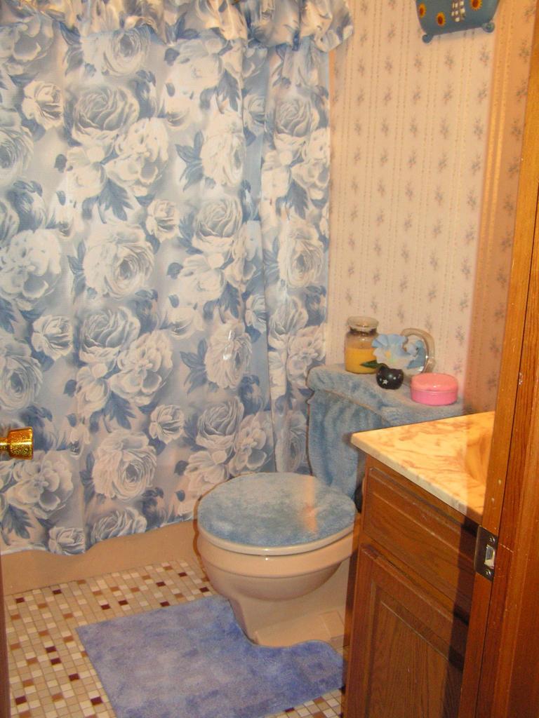 1038-15 Decker Road Arcadia, LA 71001 - Photo 12 of 19 a bathroom with a granite countertop toilet and a sink