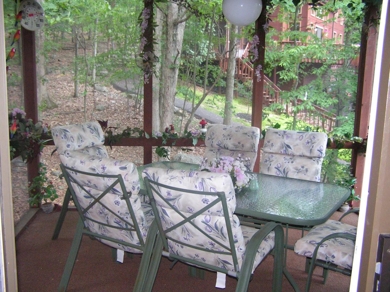 1038-15 Decker Road Arcadia, LA 71001 - Photo 5 of 19 a view of a chairs and table in backyard