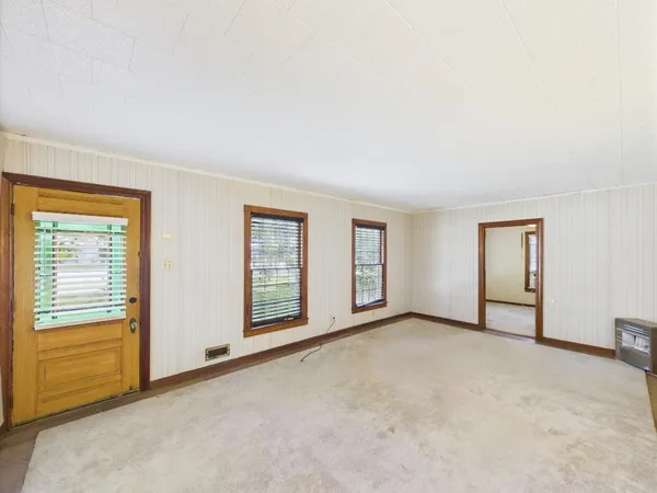 an empty room with windows