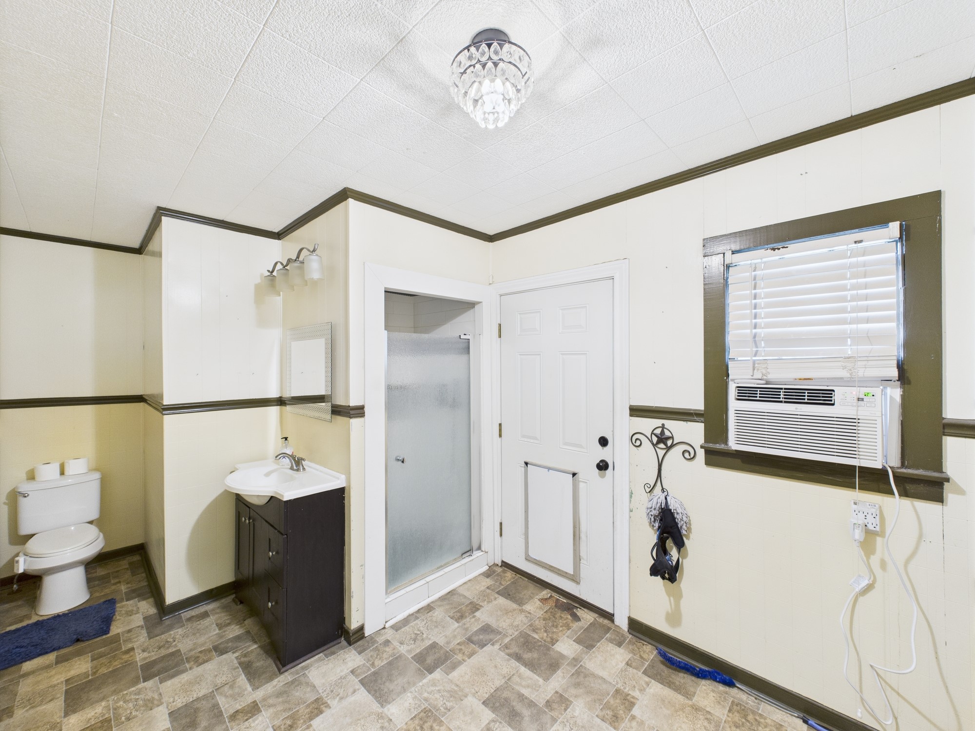 305 West Converse Street Weimar, TX 78962 - Photo 19 of 30 a view of a bathroom with a sink