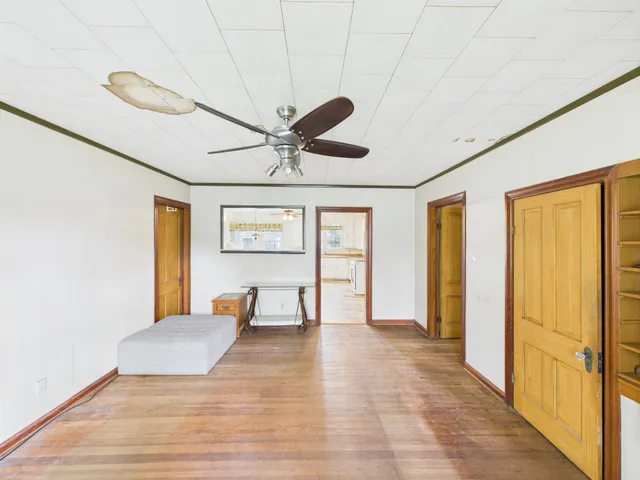 a view of an empty room with a window