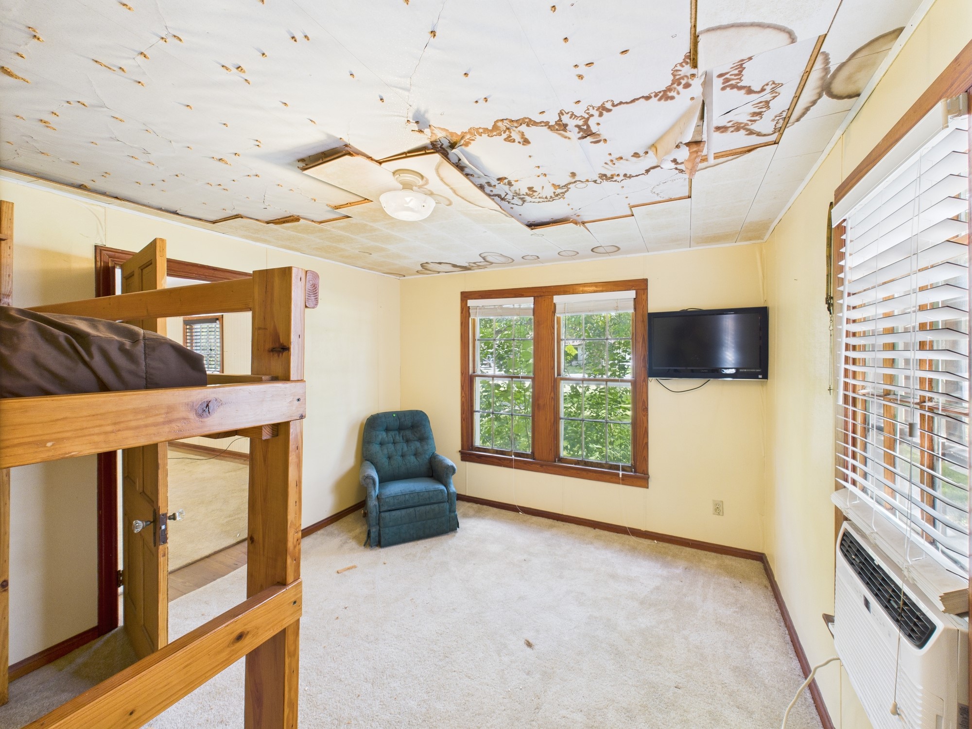 305 West Converse Street Weimar, TX 78962 - Photo 8 of 30 a view of a livingroom with furniture and a ceiling fan