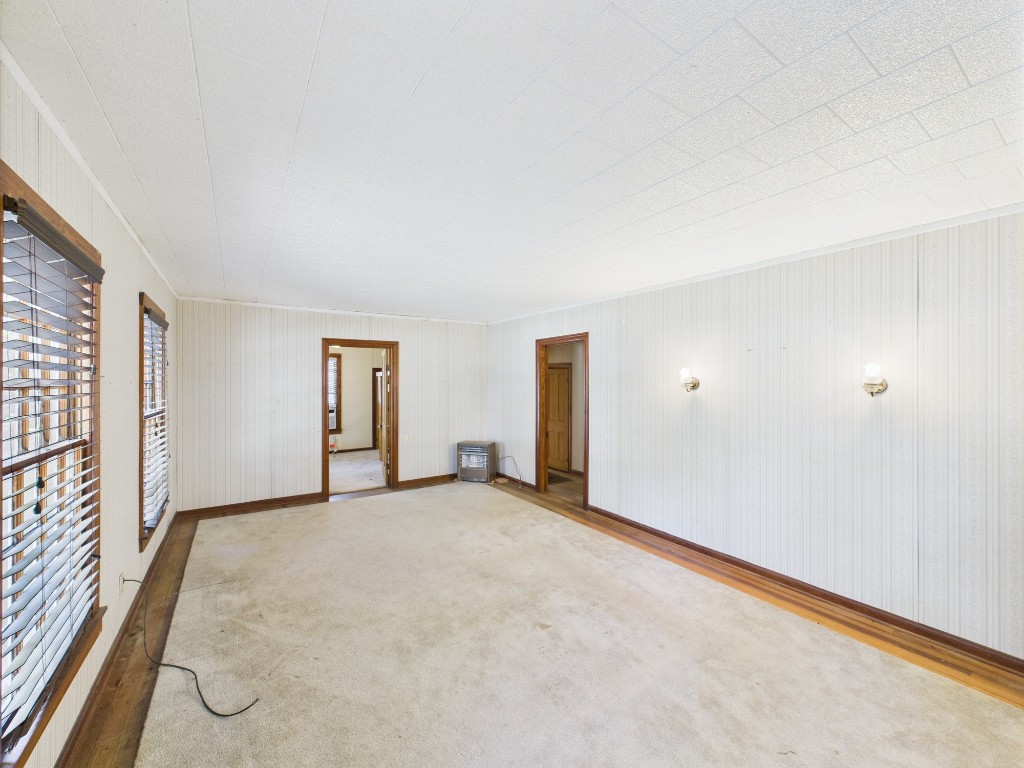 305 West Converse Street Weimar, TX 78962 - Photo 10 of 30 an empty room with windows