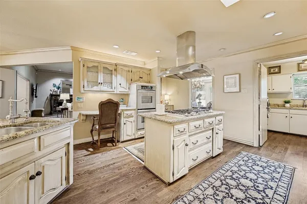 a view of living room with granite countertop furniture and a fireplace