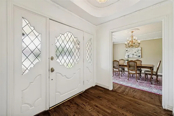a view of a livingroom with furniture and window