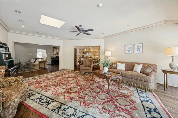 a living room with a couch and a dining table