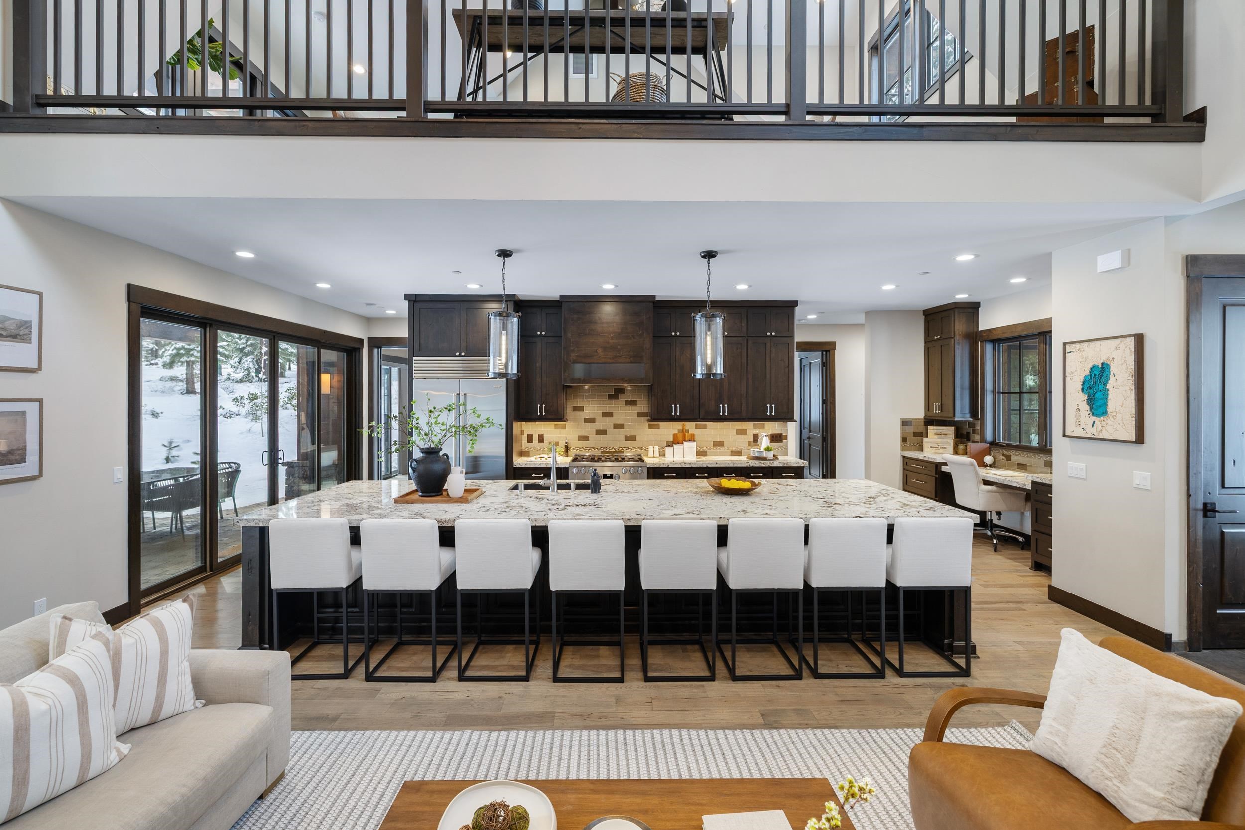10601 Carson Range Road Truckee, CA 96161 - Photo 11 of 28 a view of a living room kitchen and a chandelier