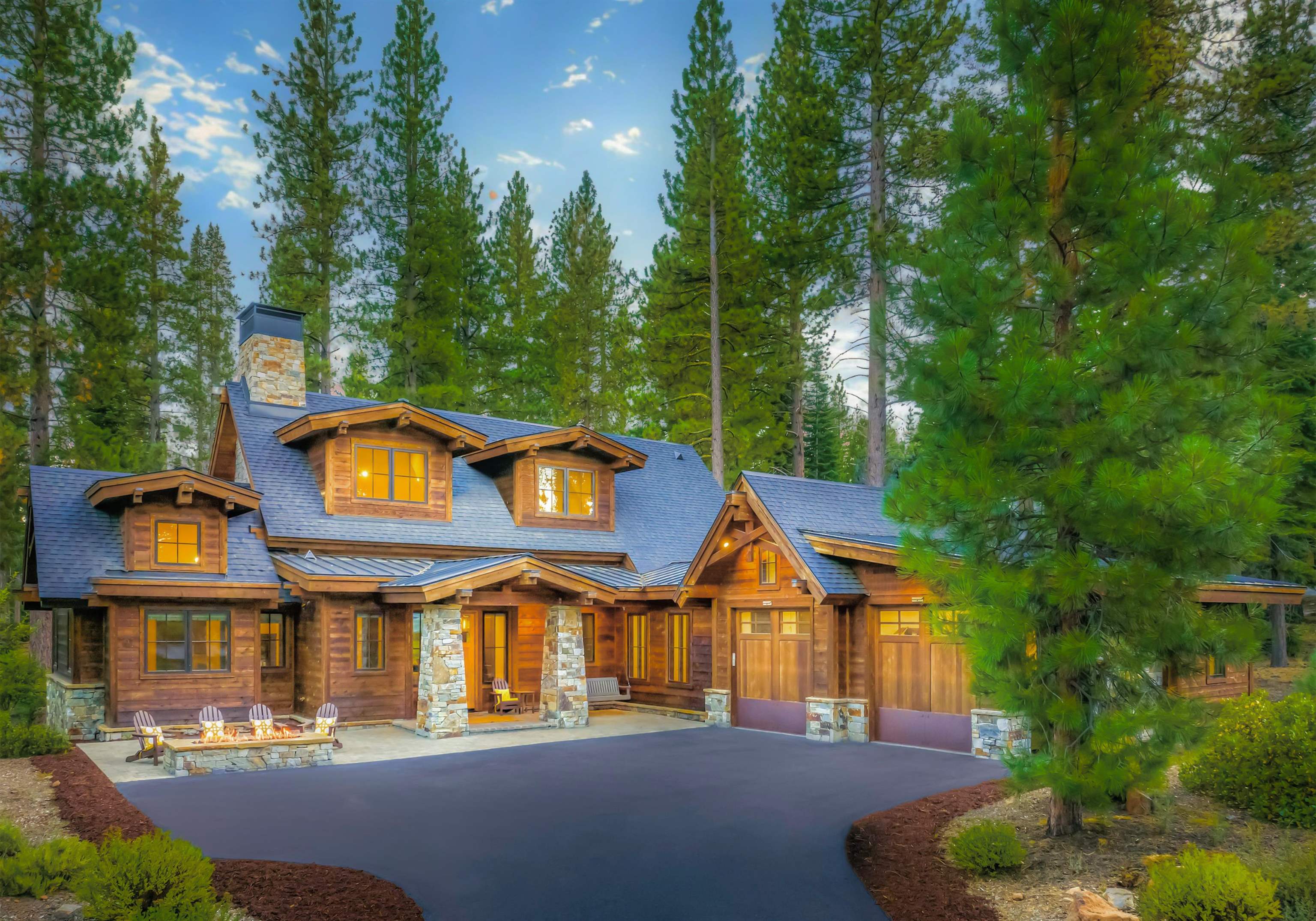 10601 Carson Range Road Truckee, CA 96161 - Photo 2 of 28 a front view of a house with garden