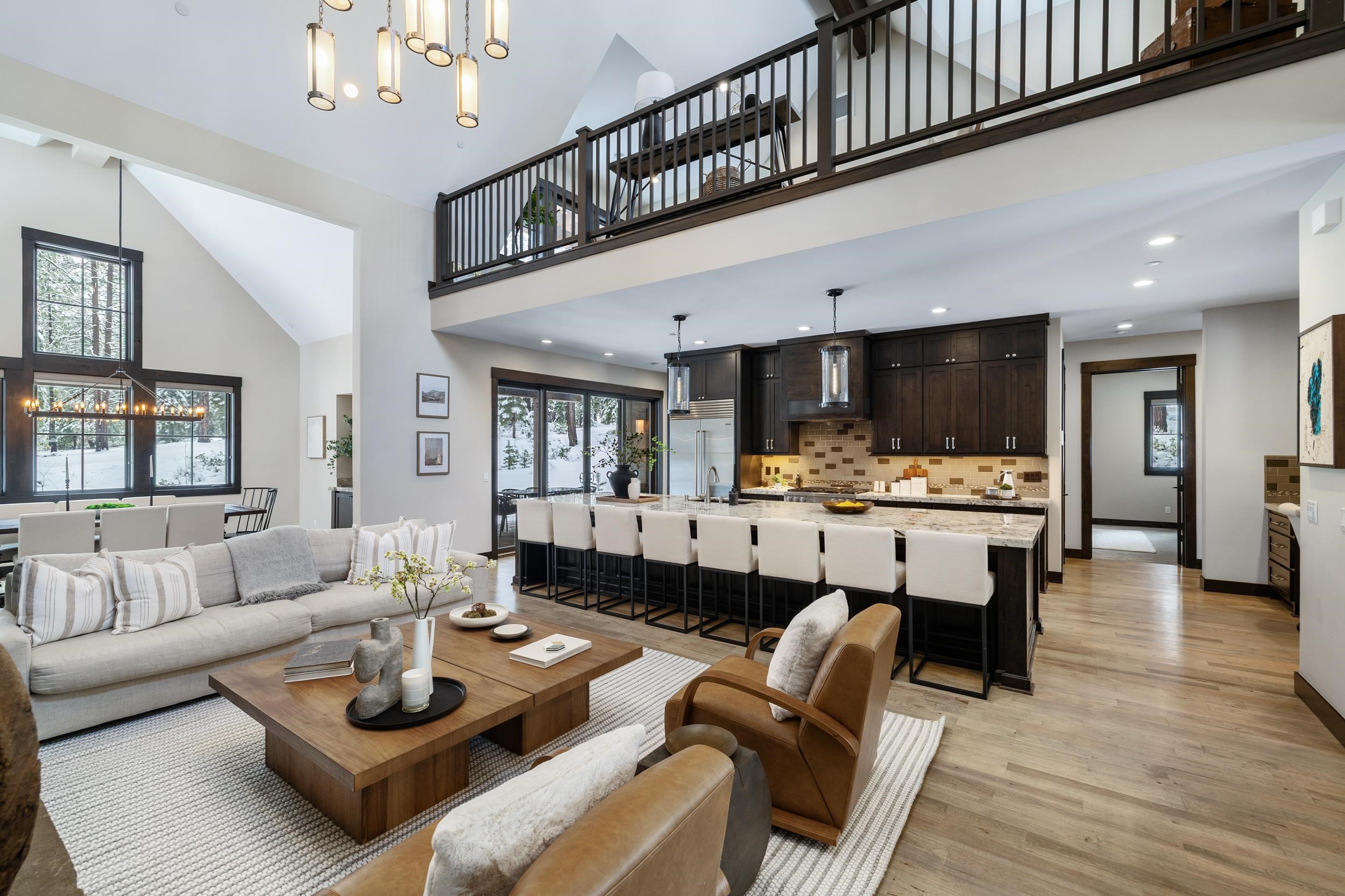 10601 Carson Range Road Truckee, CA 96161 - Photo 4 of 28 a living room with furniture kitchen view and a large window