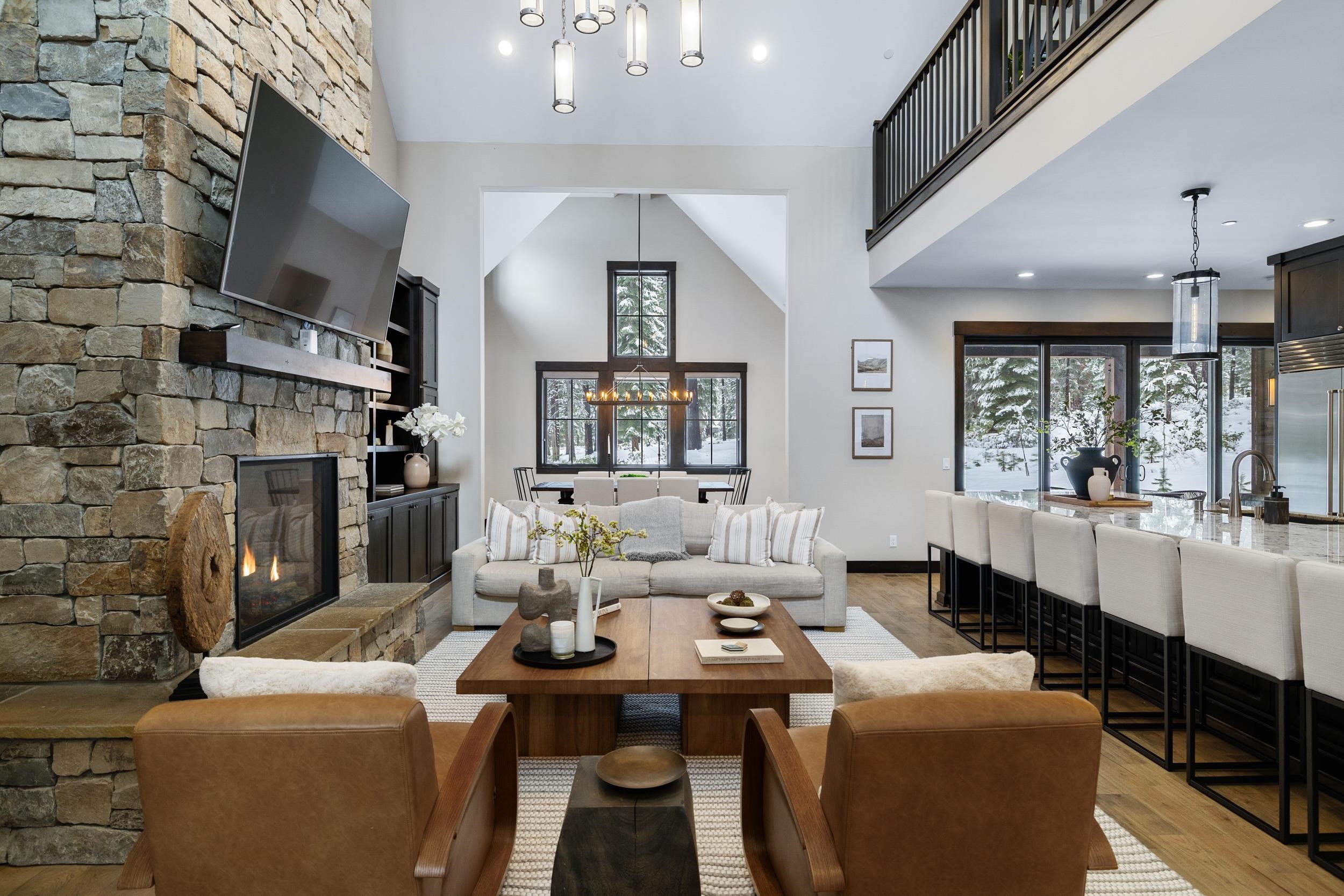 10601 Carson Range Road Truckee, CA 96161 - Photo 7 of 28 a living room with furniture a fireplace and a flat screen tv