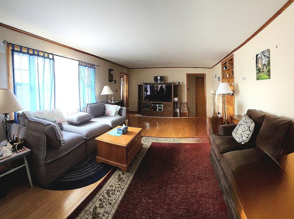 77 Connecticut Avenue Millinocket, ME 04462 - Photo 4 of 29 20260411_114803