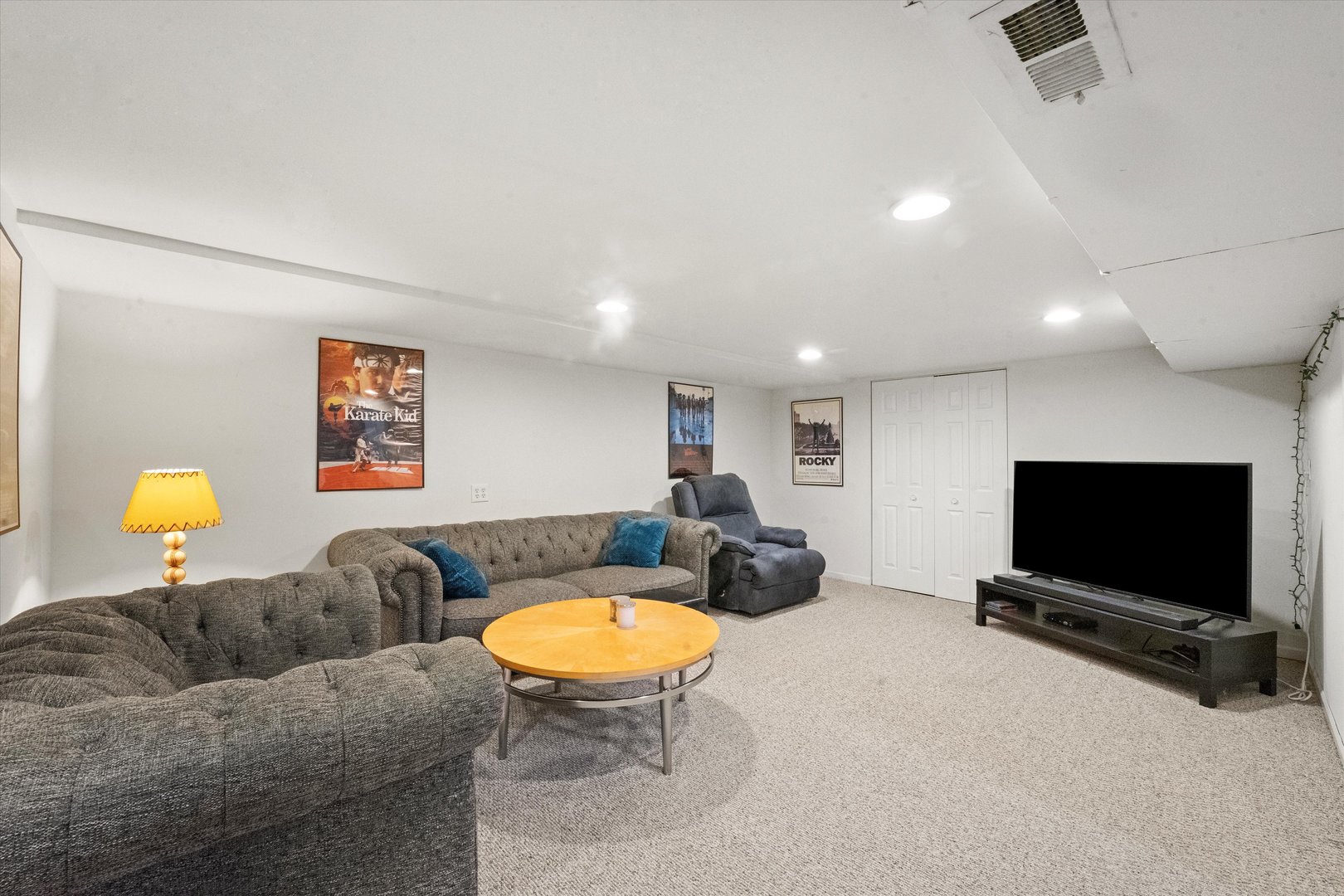 509 Spring Street Roselle, IL 60172 - Photo 14 of 31 a living room with furniture and a flat screen tv