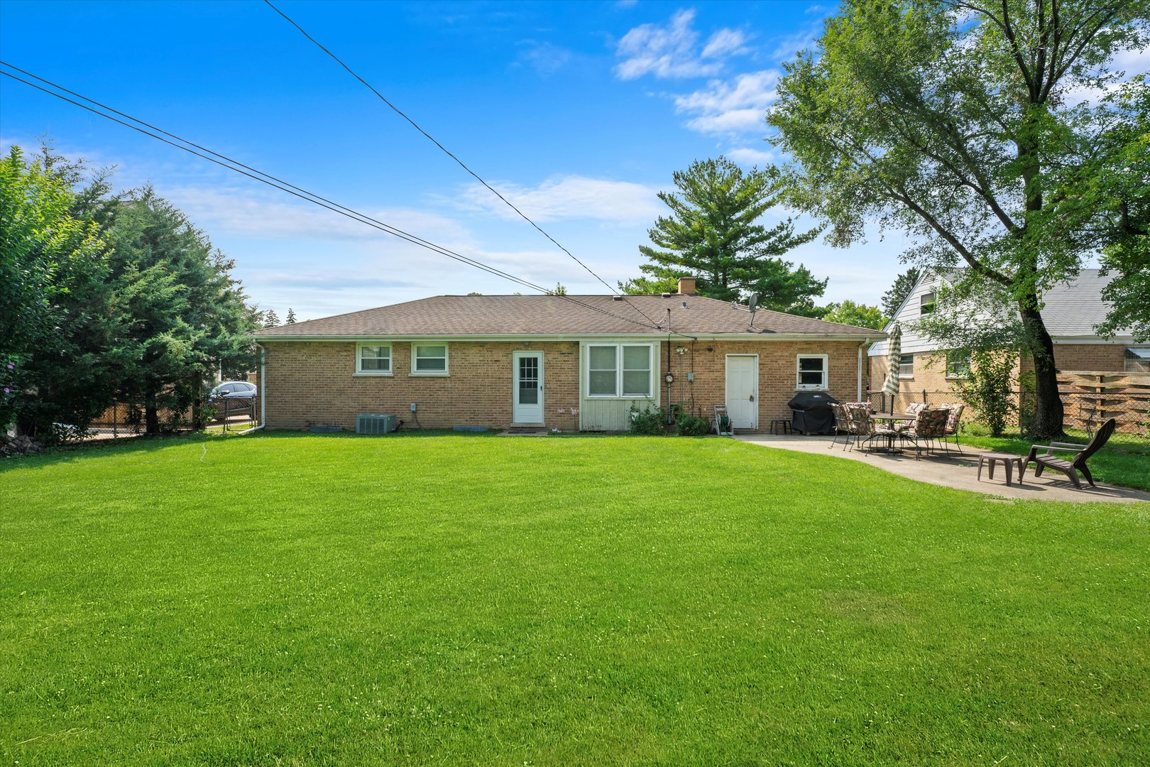 509 Spring Street Roselle, IL 60172 - Photo 27 of 31 a front view of a house with a garden