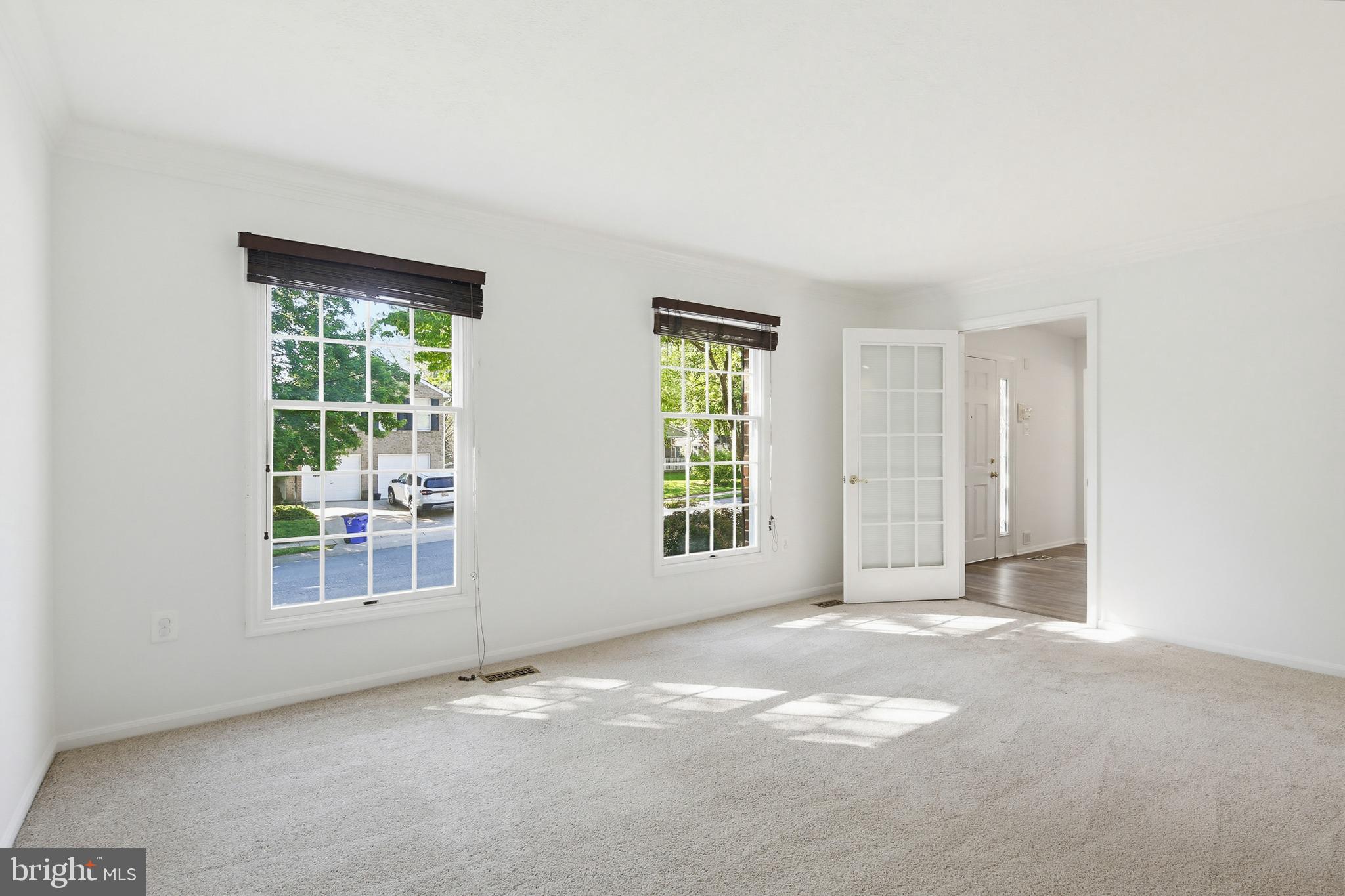 4608 Old Dragon Path Ellicott City, MD 21042 - Photo 19 of 60 an empty room with windows