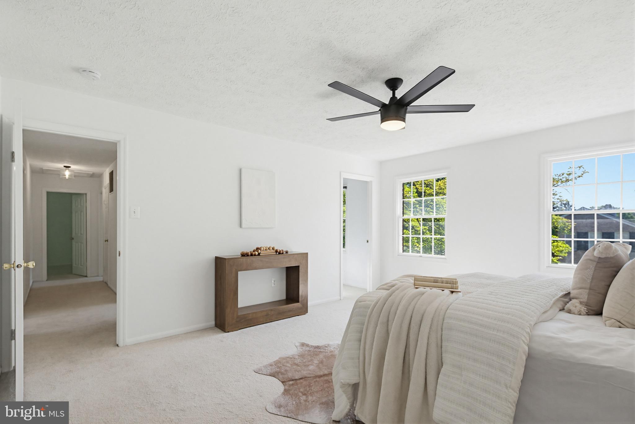 4608 Old Dragon Path Ellicott City, MD 21042 - Photo 26 of 60 a bed room with a bed and a television