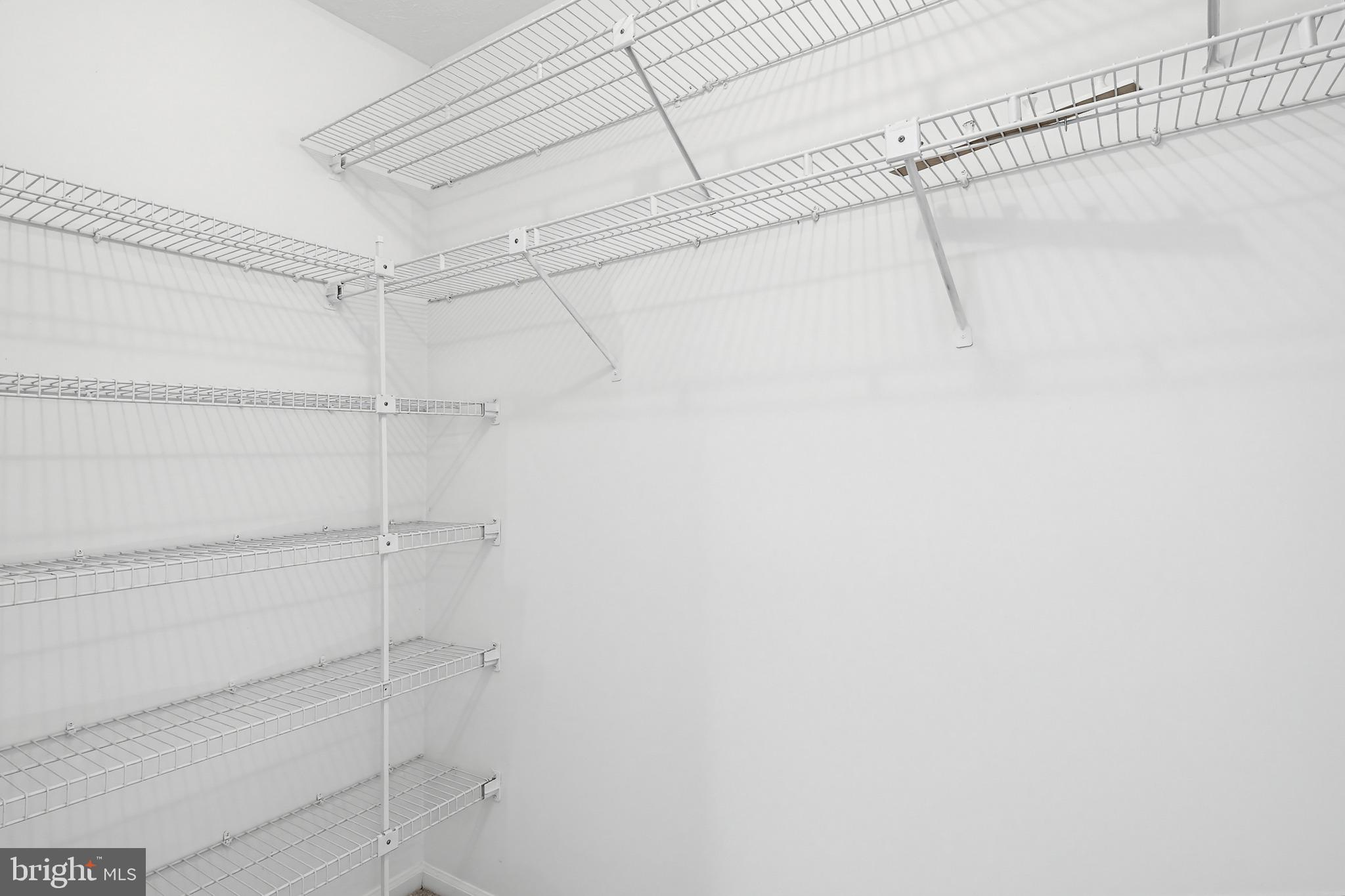 4608 Old Dragon Path Ellicott City, MD 21042 - Photo 29 of 60 a view of a room with racks on the wall