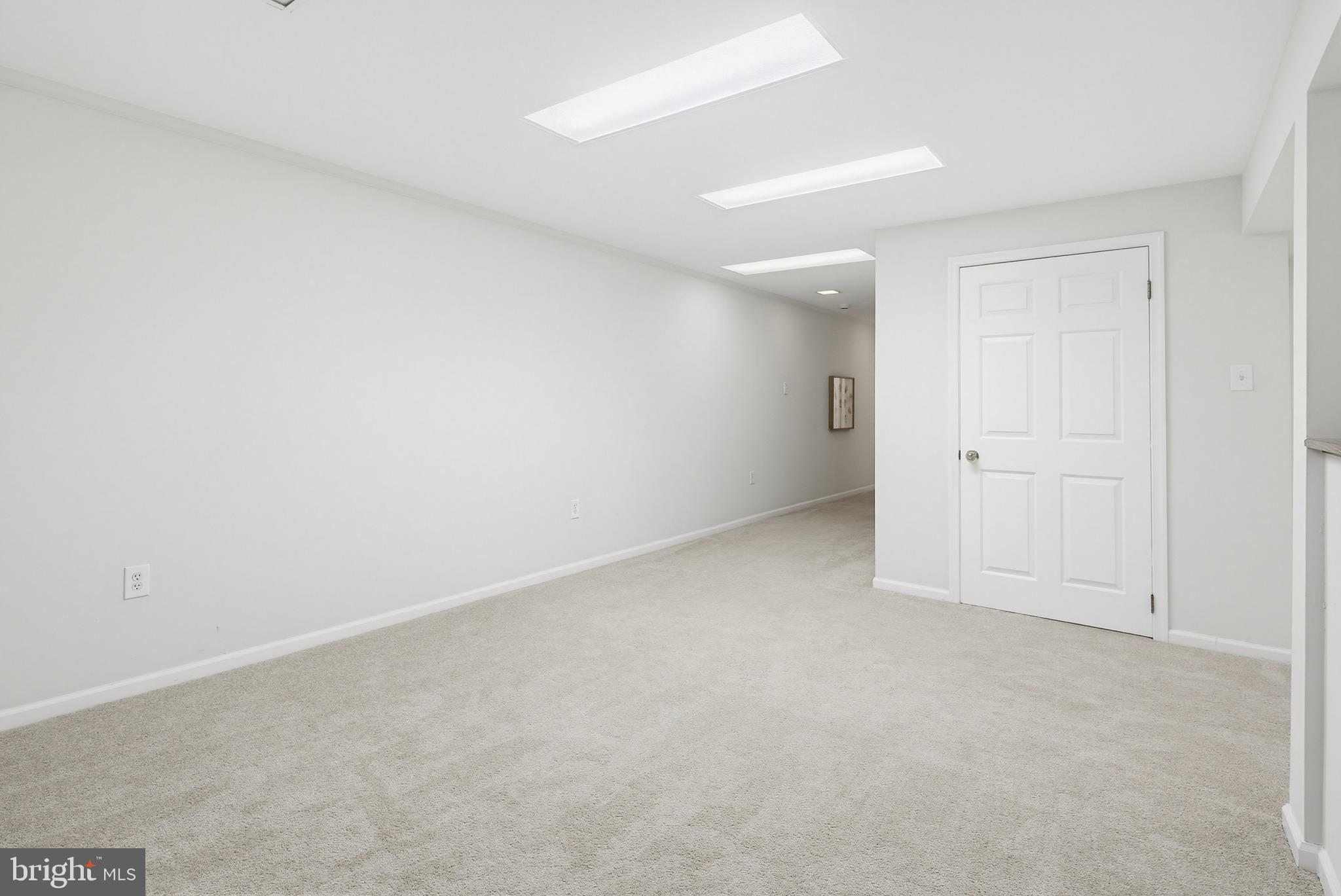 4608 Old Dragon Path Ellicott City, MD 21042 - Photo 47 of 60 an empty room with an entryway