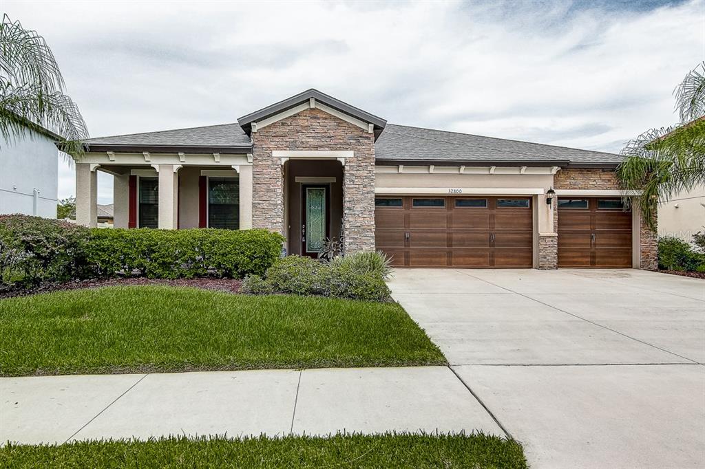 32800 Natural Bridge Road Wesley Chapel, FL 33543 - Photo 1 of 1 Beautiful Curb Appeal!