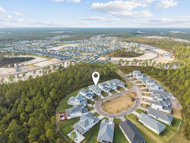 a view of a balcony with table and chairs