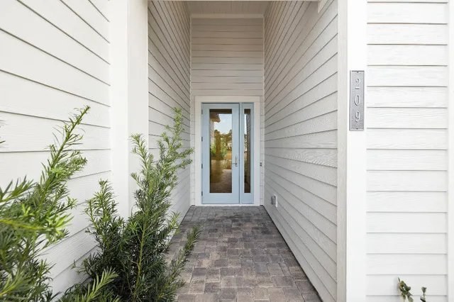 a view of a pathway with a house