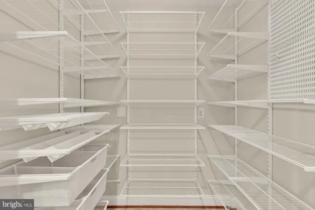a view of an empty walk in closet