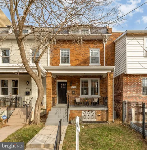 a view of a house with basket ball court