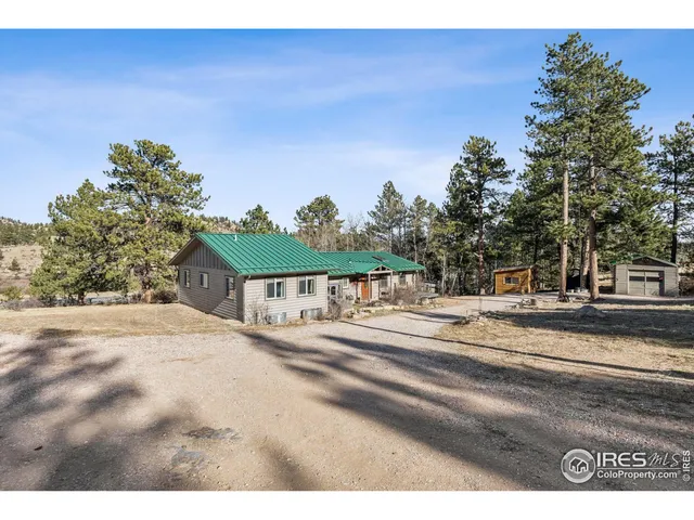 a view of a backyard of a house