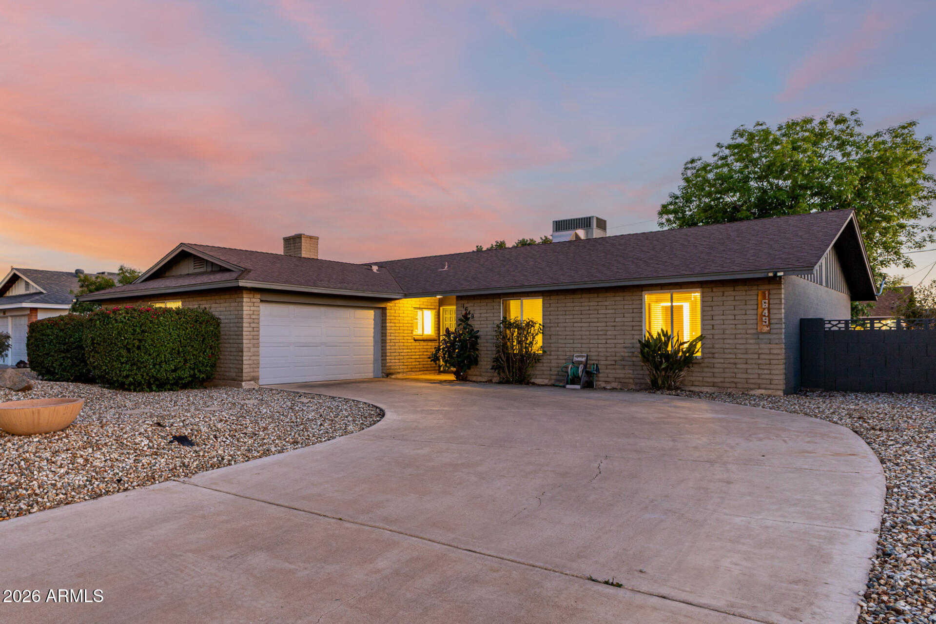 1649 West Royal Palm Road Phoenix, AZ 85021 - Photo 1 of 32 a view of a house with a backyard and a yard