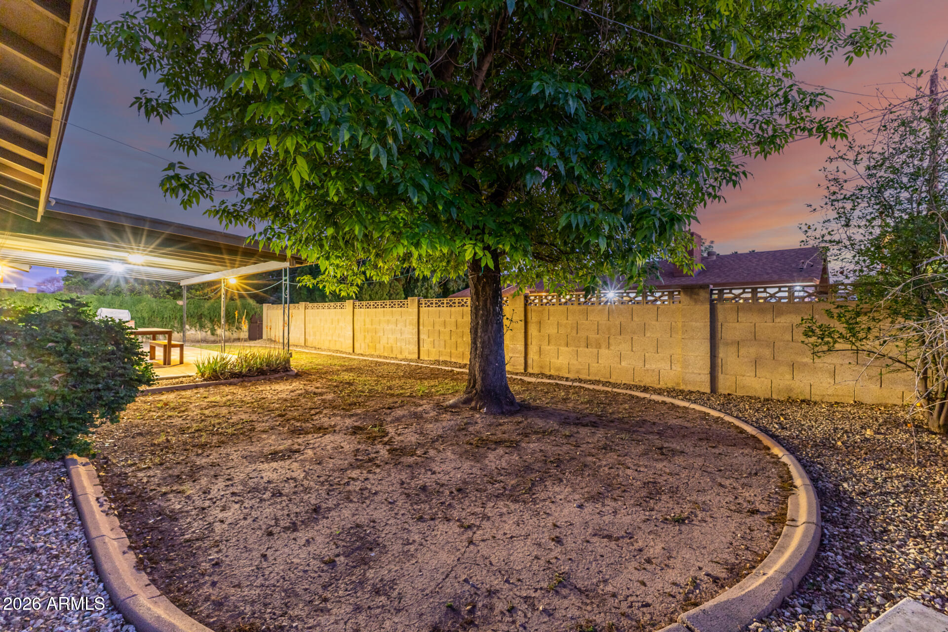 1649 West Royal Palm Road Phoenix, AZ 85021 - Photo 23 of 32 a view of a house with a small yard