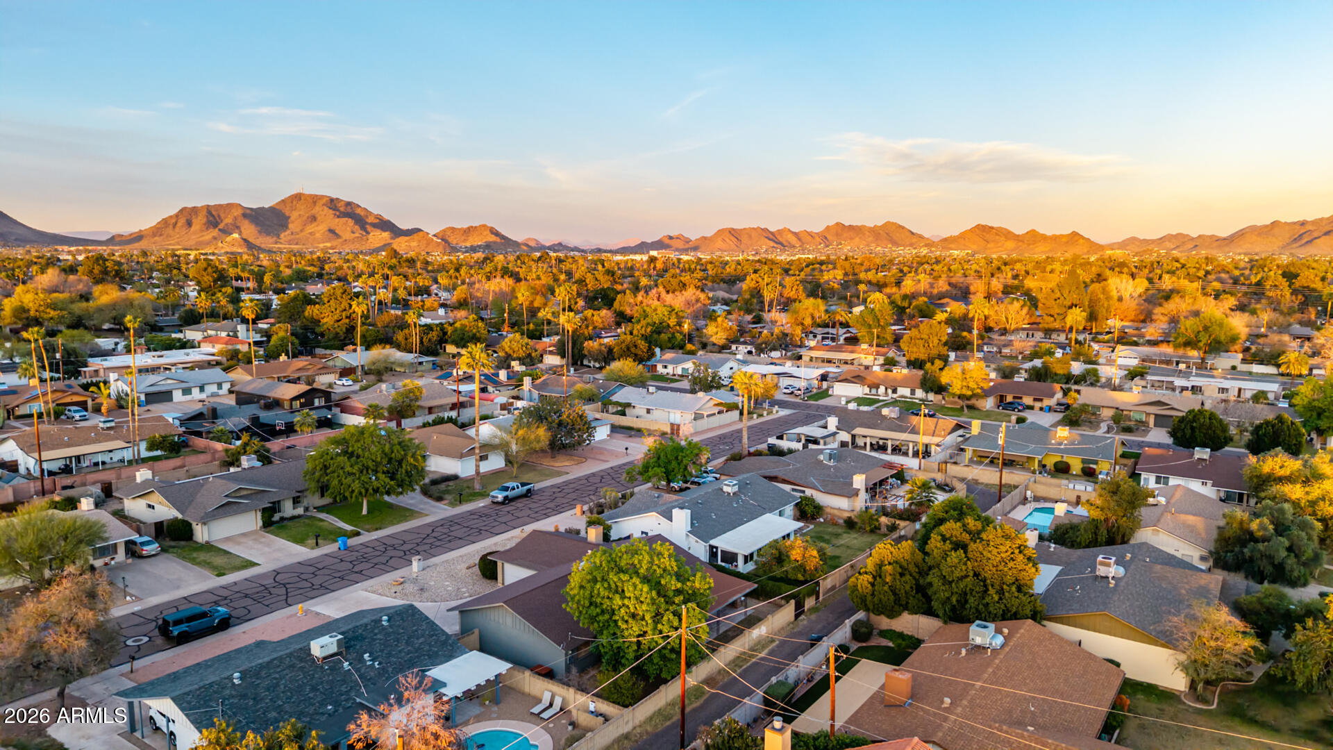 1649 West Royal Palm Road Phoenix, AZ 85021 - Photo 31 of 32 an aerial view of residential houses with outdoor space