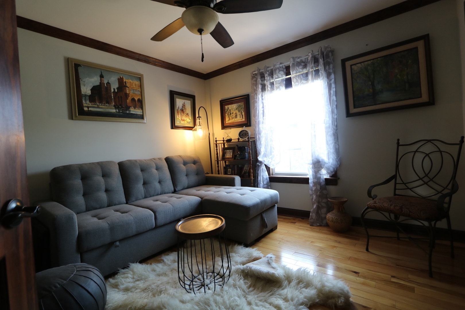 1594 Baytree Drive Romeoville, IL 60446 - Photo 12 of 32 a living room with furniture and a chandelier