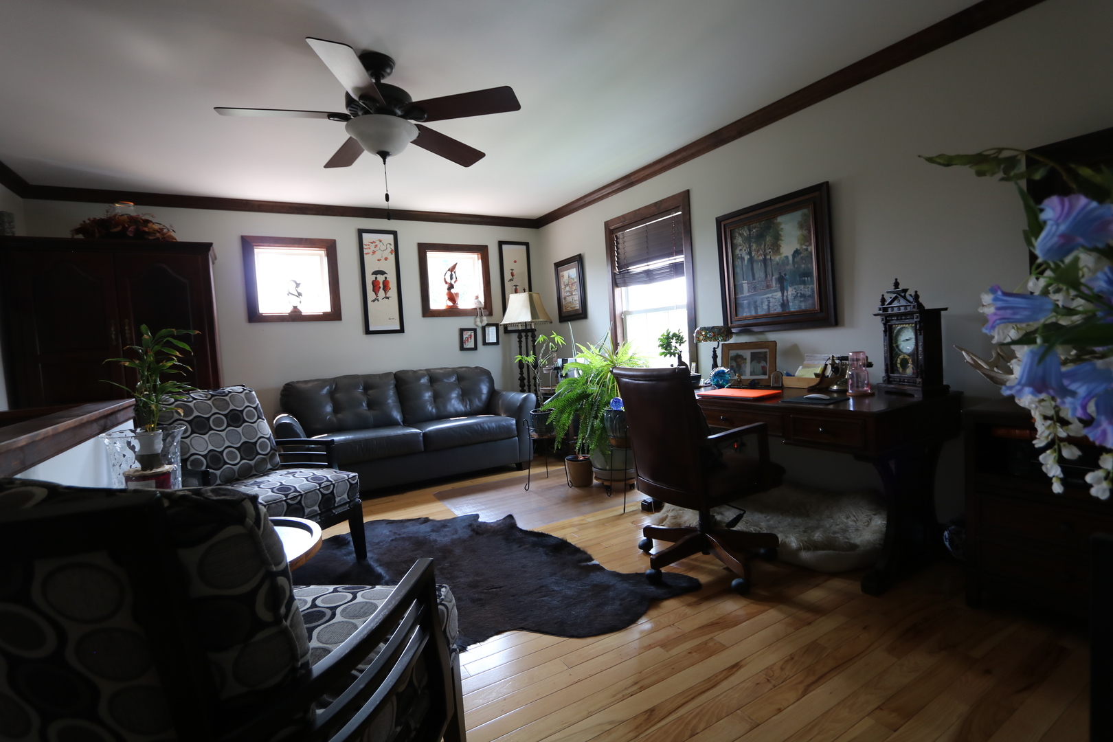 1594 Baytree Drive Romeoville, IL 60446 - Photo 13 of 32 a living room with furniture a window and a flat screen tv