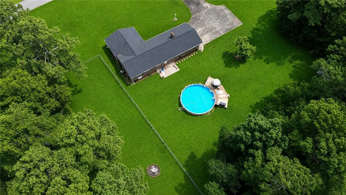 307 Mar-Mac Road Anderson, SC 29626 - Photo 3 of 19 Expansive green grounds envelop this home, complete with an above-ground pool and surrounding deck.