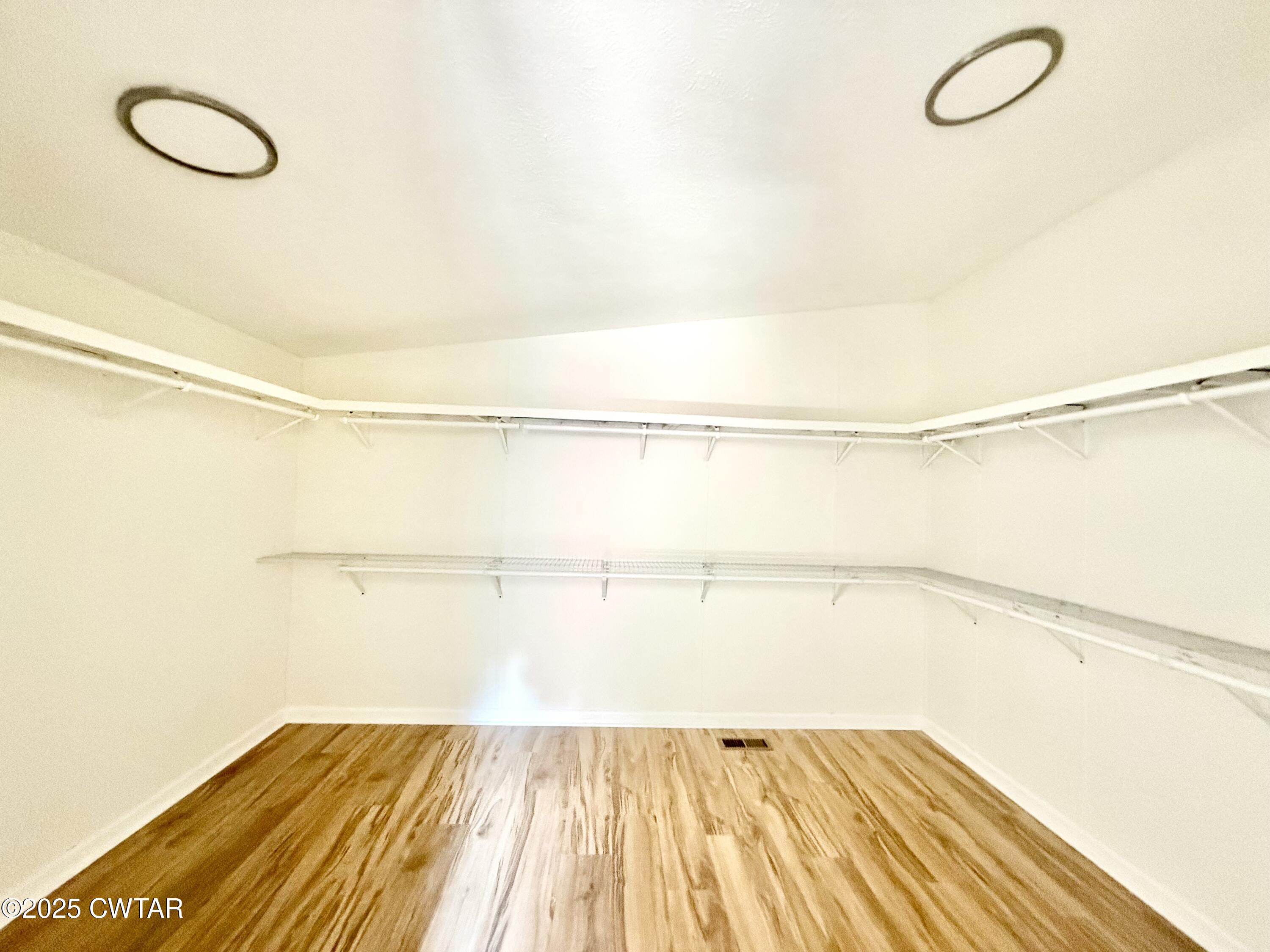 390 Emerson Road Gates, TN 38037 - Photo 29 of 54 a view of a room with racks on the wall