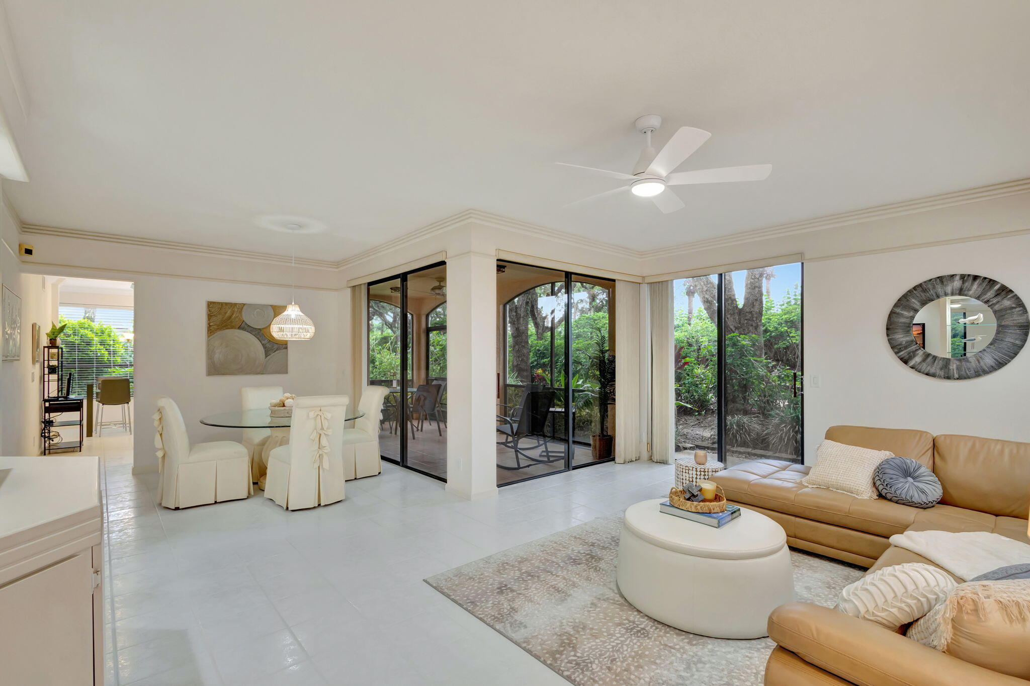 16151 West Bay Drive, Unit 161 Jupiter, FL 33477 - Photo 10 of 25 a living room with furniture and a large window